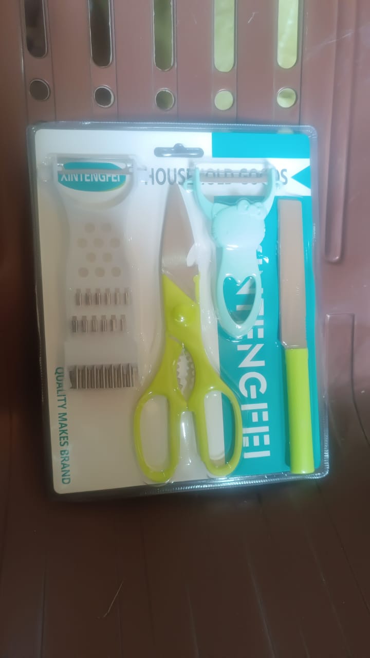 4-Piece Kitchen Cutting Set: Scissors, Peeler, Grater / Slicer, and Knife 4-Piece Kitchen Cutting Set: Scissors, Peeler, Grater / Slicer, and Knife